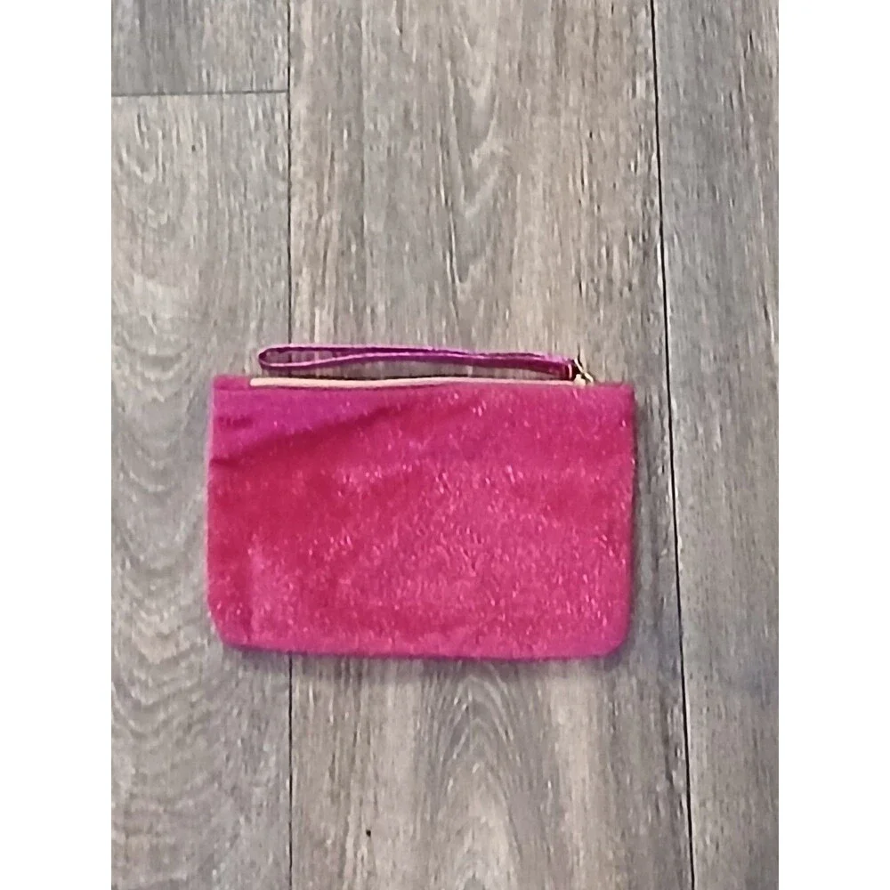 Pink fuzzy Ipsy cosmetic bag
